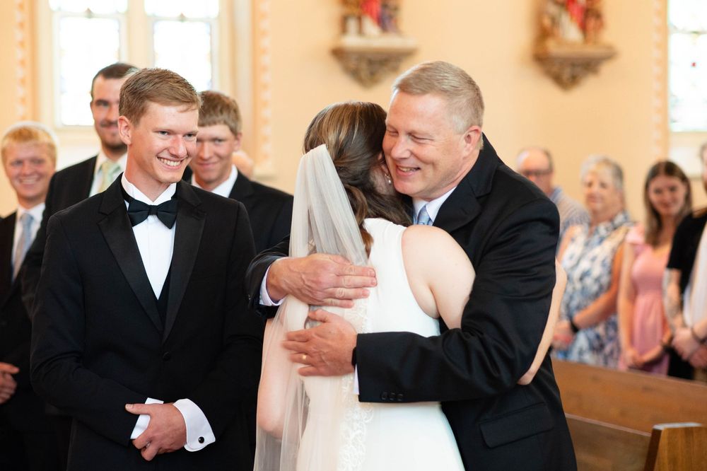 wedding photographer, St. Charles, Illinois, Edwardsville, St. Louis, Catholic Church, Sacrament, candid, mass, dad and bride down the aisle