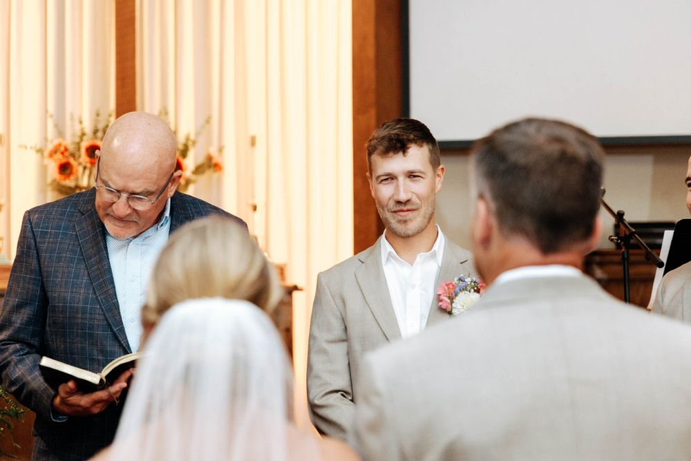 groom's reaction at Church Wedding photos captured by Autumn case with DreamStudios LLC
