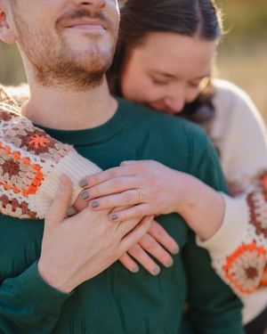 Close-up sequence showing hands with engagement ring in warm sunlight during golden hour.
