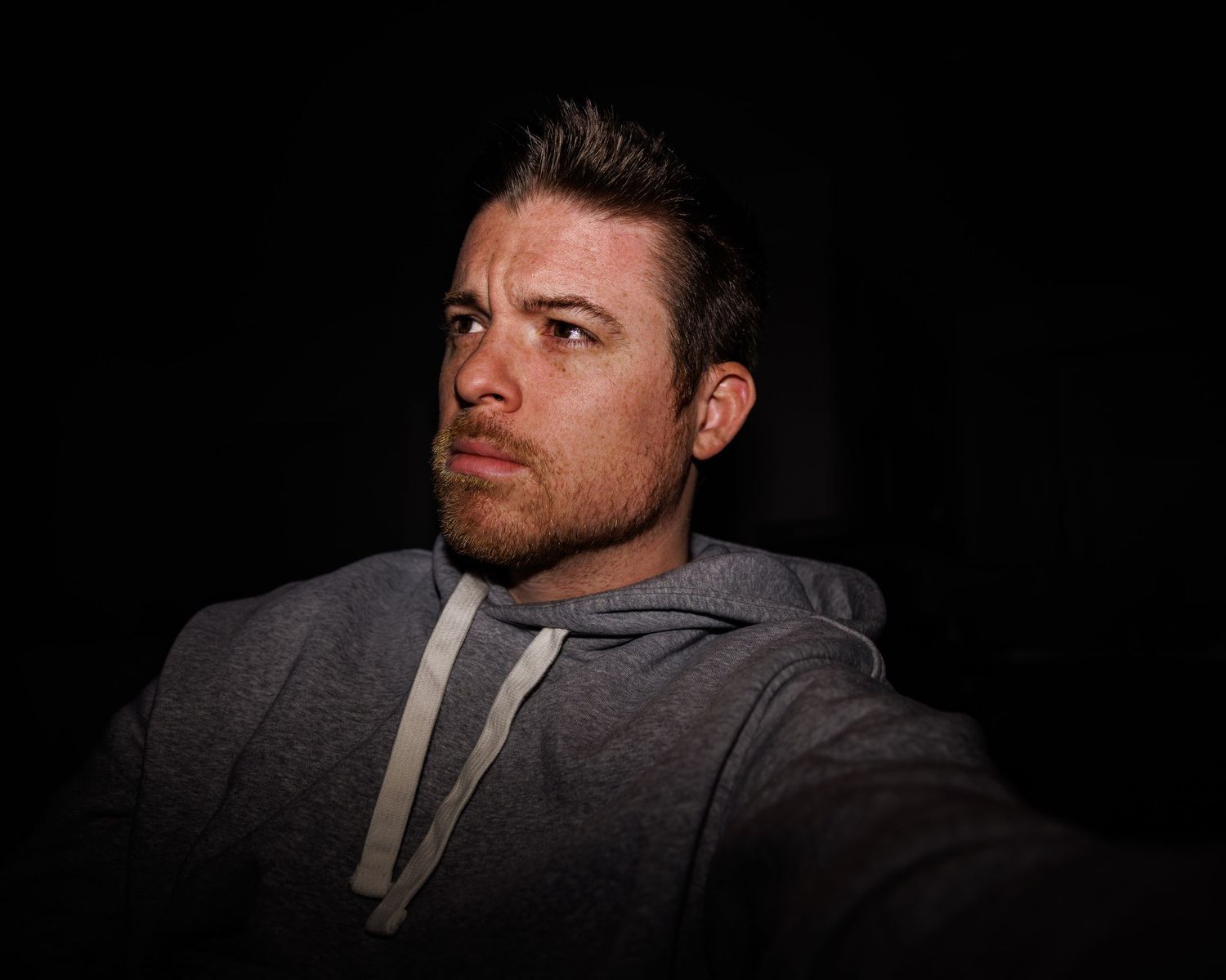 Side Profile Portrait of Jake Whiting, sports photographer based in Boston, Massachusetts.