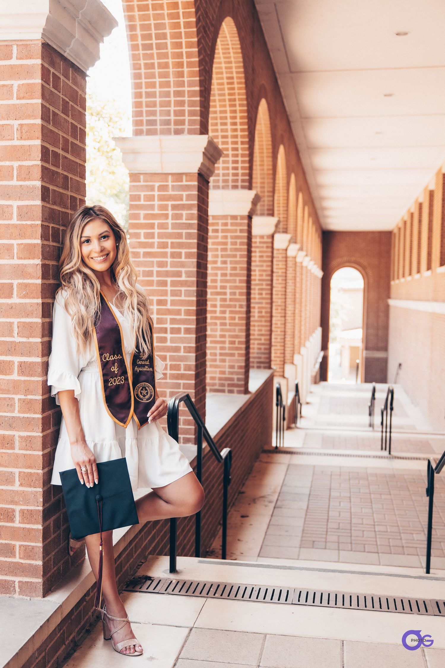 A series of outdoor portraits taken in a brick colonnade walkway with arched columns and natural lighting.