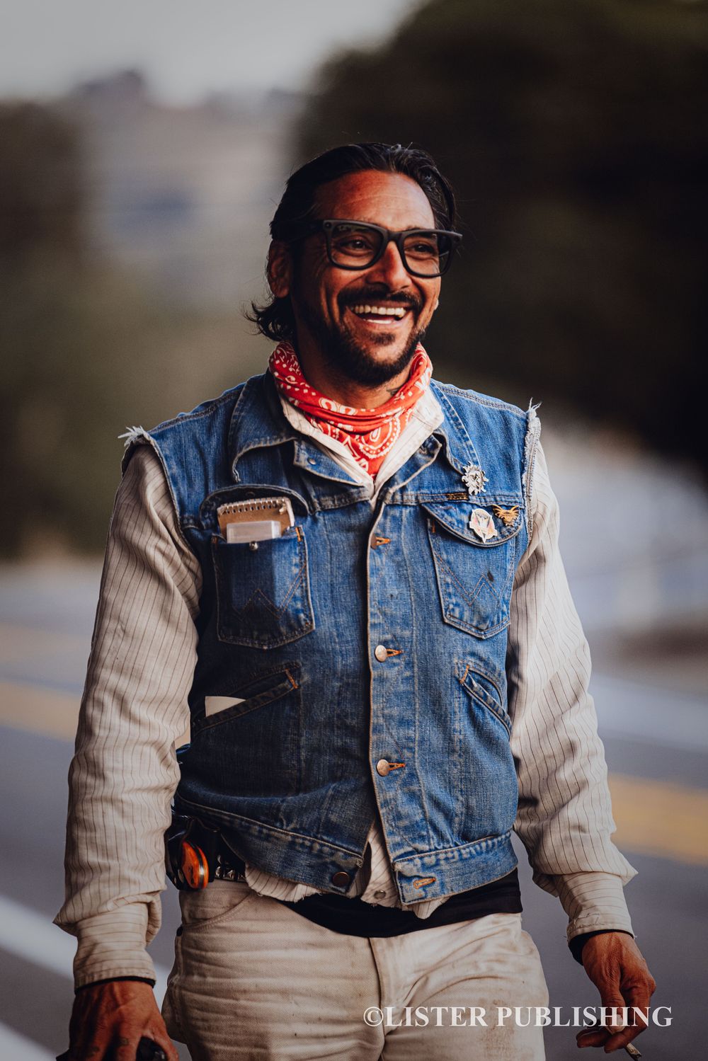 Person wearing denim vest and bandana showing joyful expressions in series of portraits.