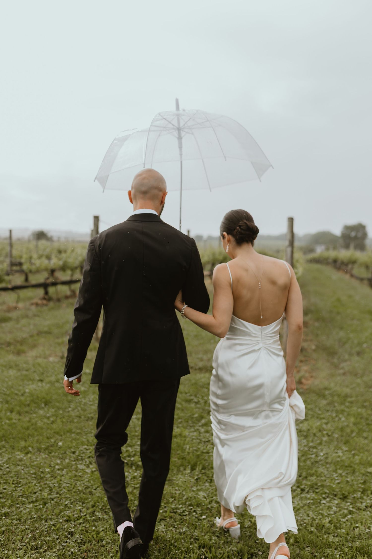 Rainy wedding portraits with Long Island bride and groom