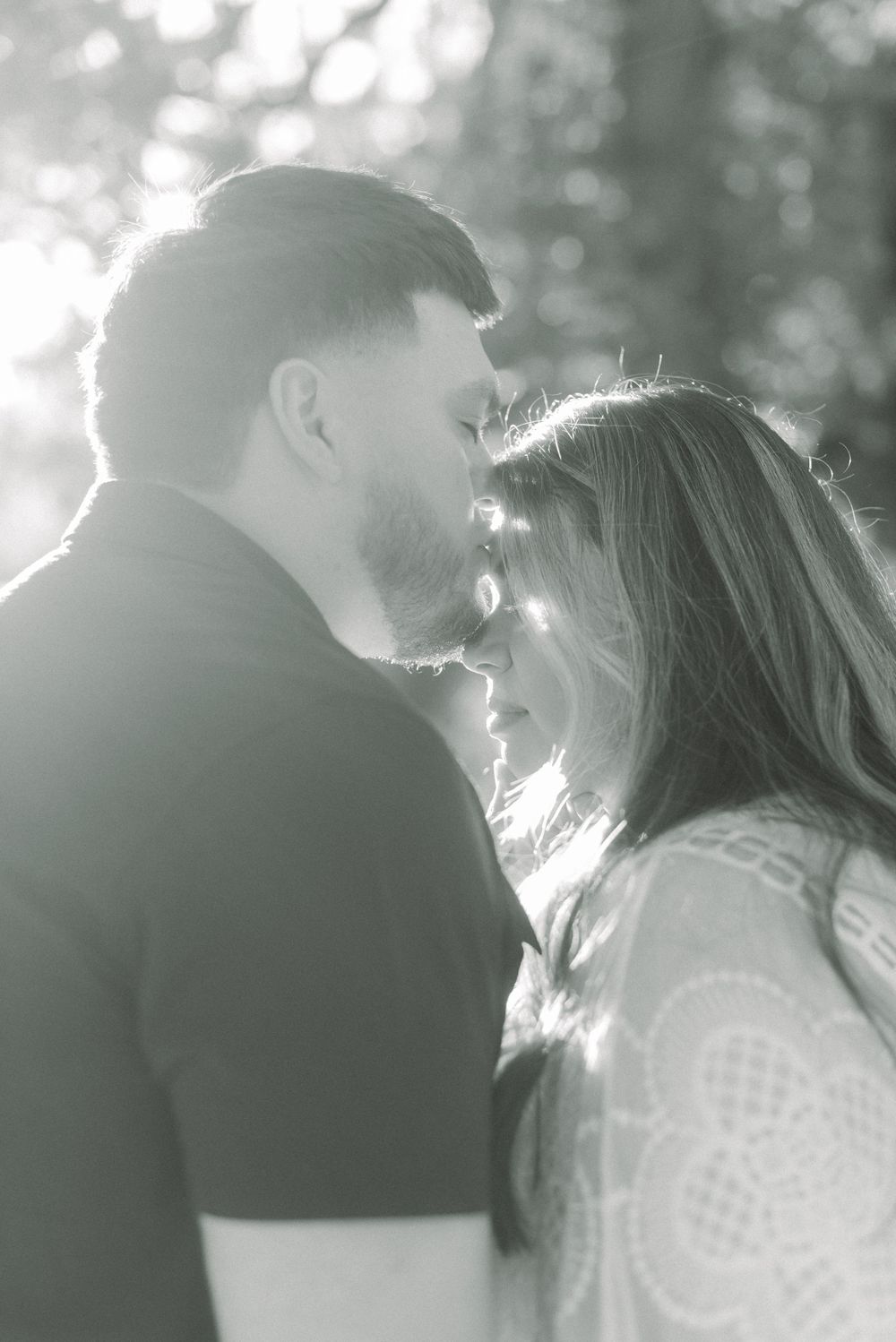 A couple poses for their engagement shoot in Stockton, CA. Photographed by Shumesa Mohsin