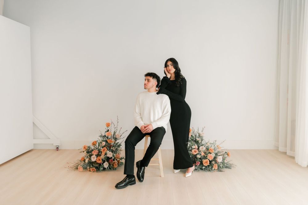 Palestinian/Libyan couple posing in a Sacramento, CA studio Photographed by Shumesa Mohsin