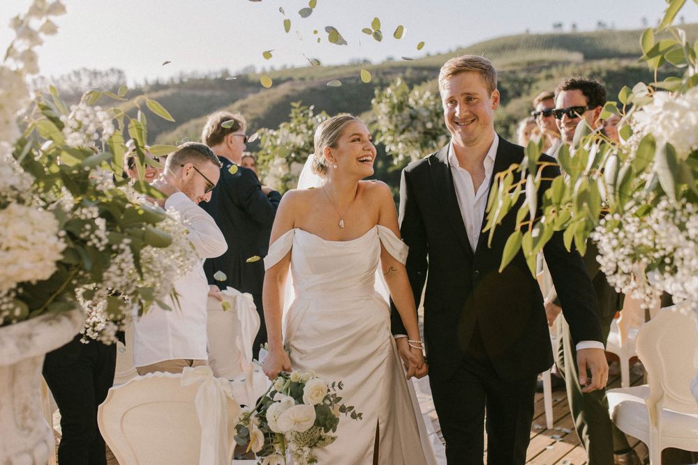 Happy confetti toss- emotive wedding photography