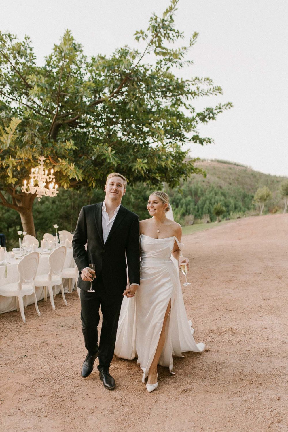 Cinematic couple photo at sunset — luxury wedding photography for modern romantics