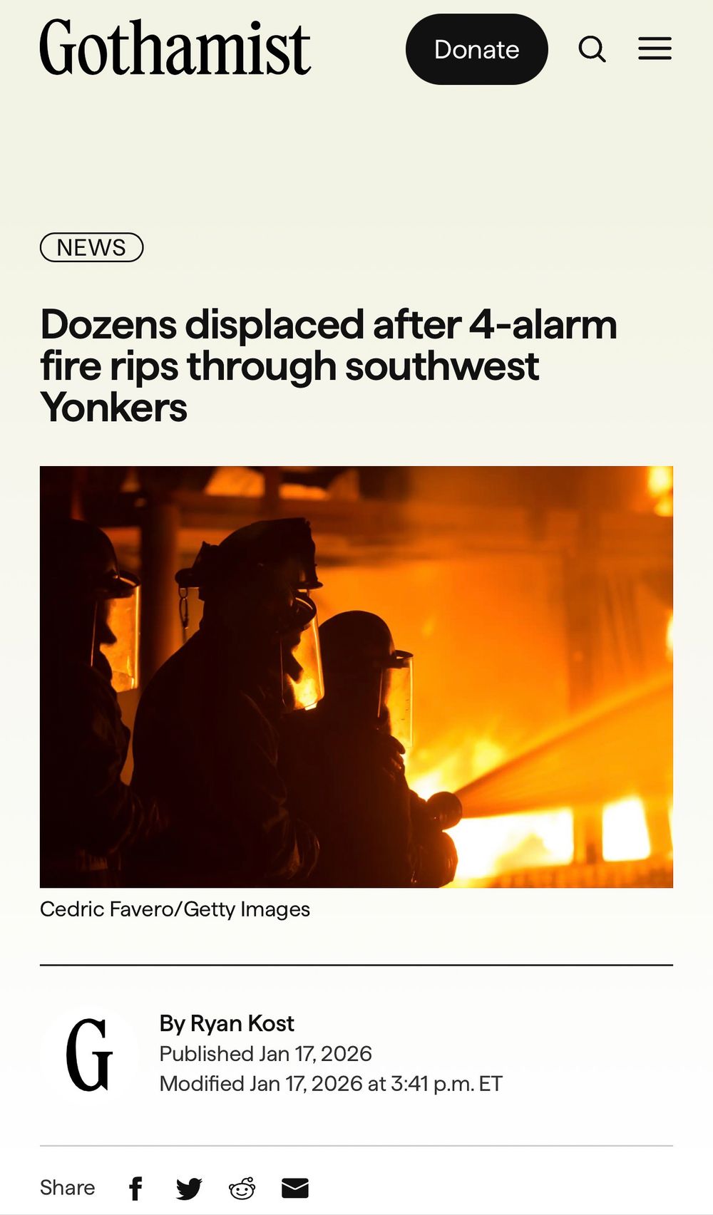 Intense orange flames engulf a building during a 4-alarm fire in southwest Yonkers as firefighters respond to the scene.