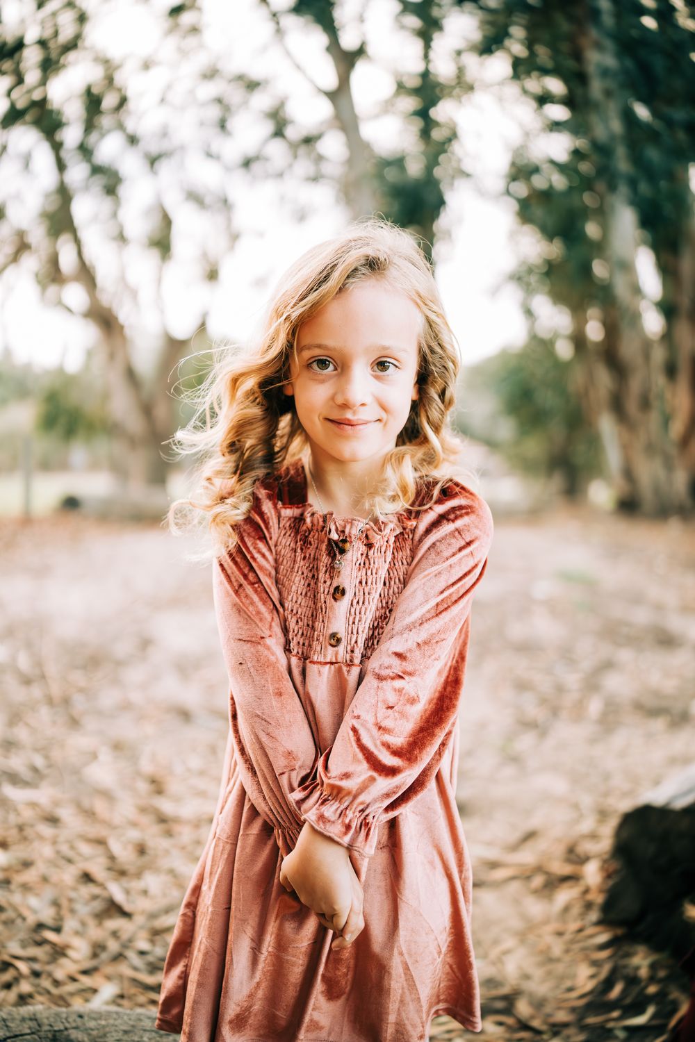 Blonde little girl posing in a pink dress, Santa Maria, CA