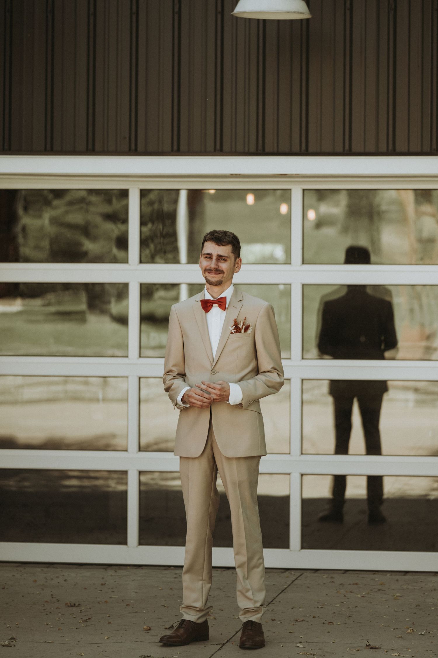 the groom on his wedding day at the Rolling Ridge wedding venue in St. Joseph MN.