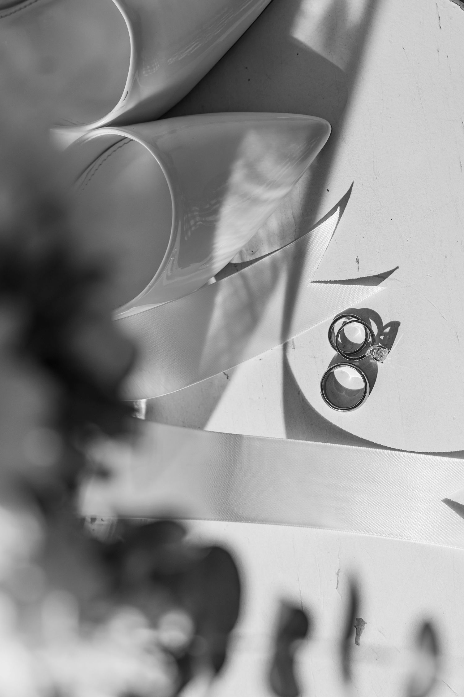 Abstract black and white artistic detail shot with curved lines and shadows.