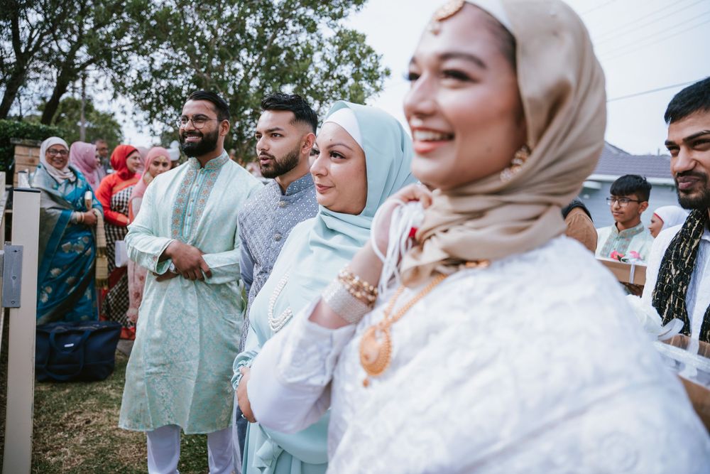 Guests welcoming the groom on arrival at a Sydney Nikah ceremony