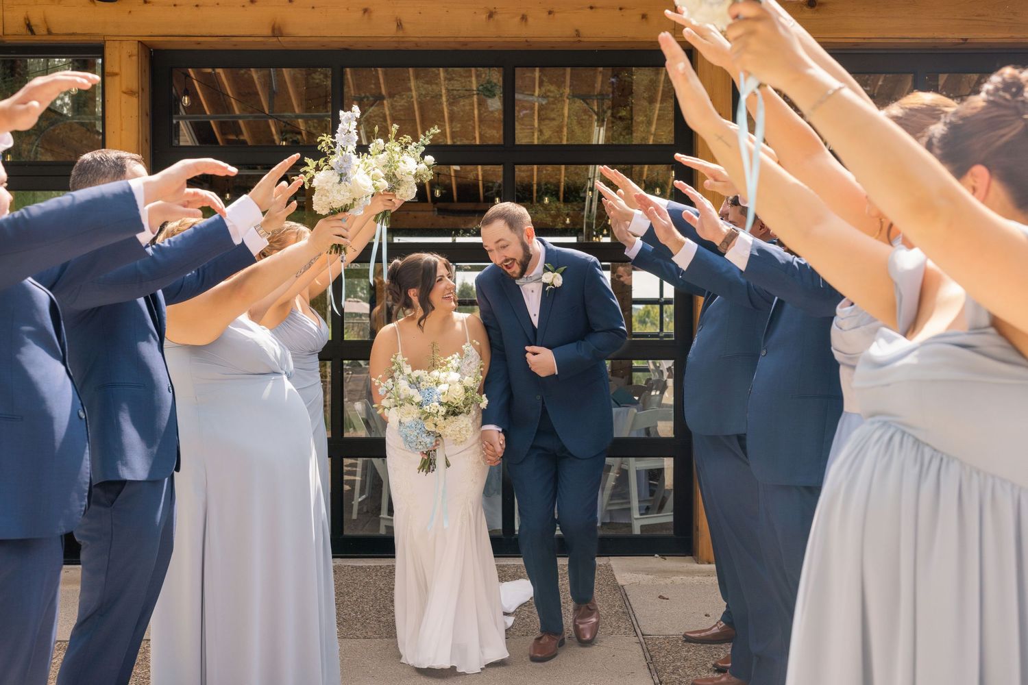 Bridesmaids in light blue dresses and groomsmen in navy at Licking Springs Country Club, Newark, Ohio