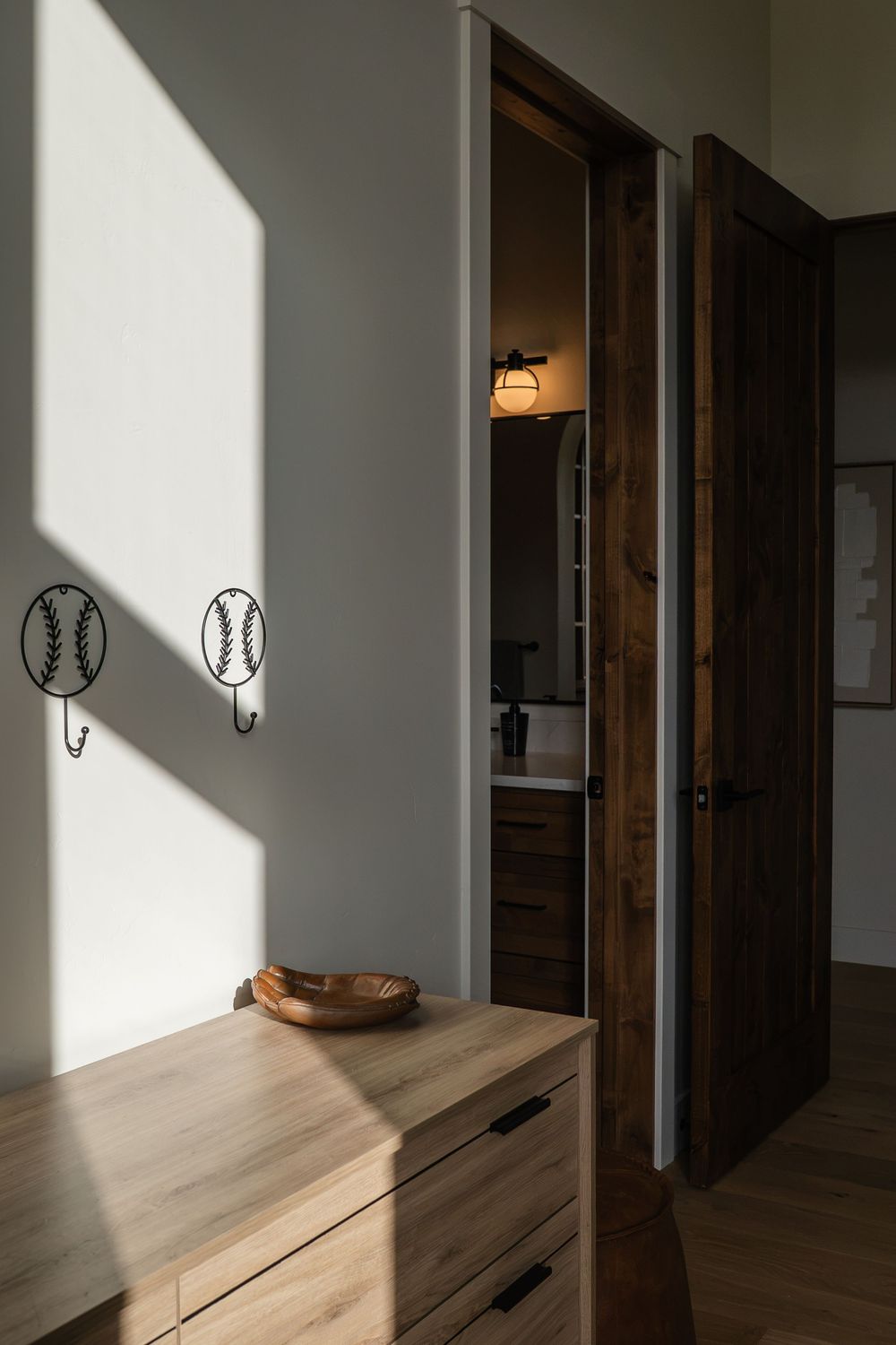 shadows and baseball decor in bedroom