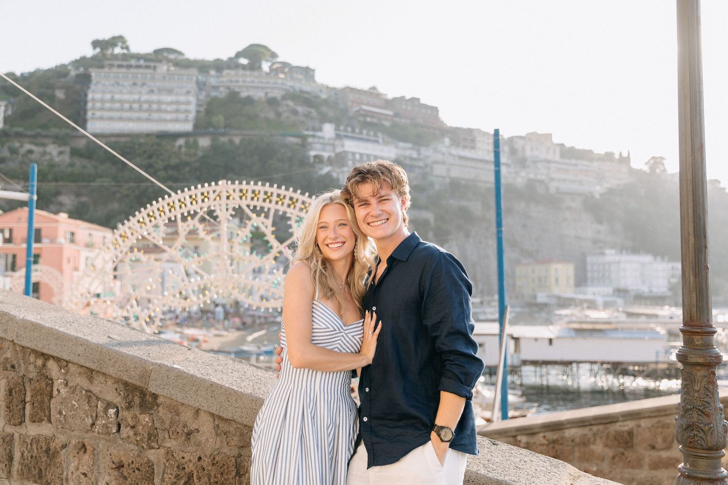 A couple posing in Marina Grande of Sorrento