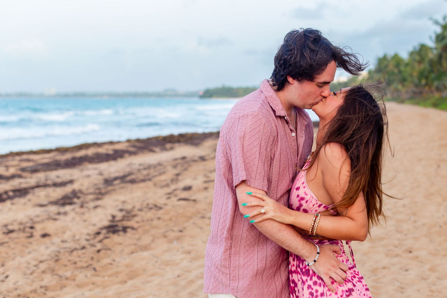 Couples portrait on the beach. Kissing. Río Grande, Puerto Rico.