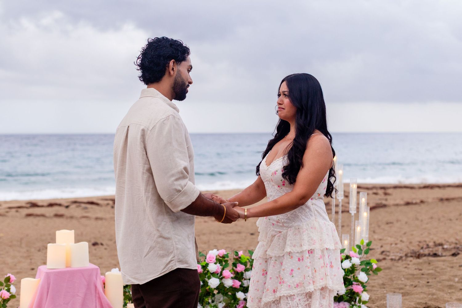 Marriage proposal on the beach with flowers and candles. Playa Guajataca, Isabela, Puerto Rico.