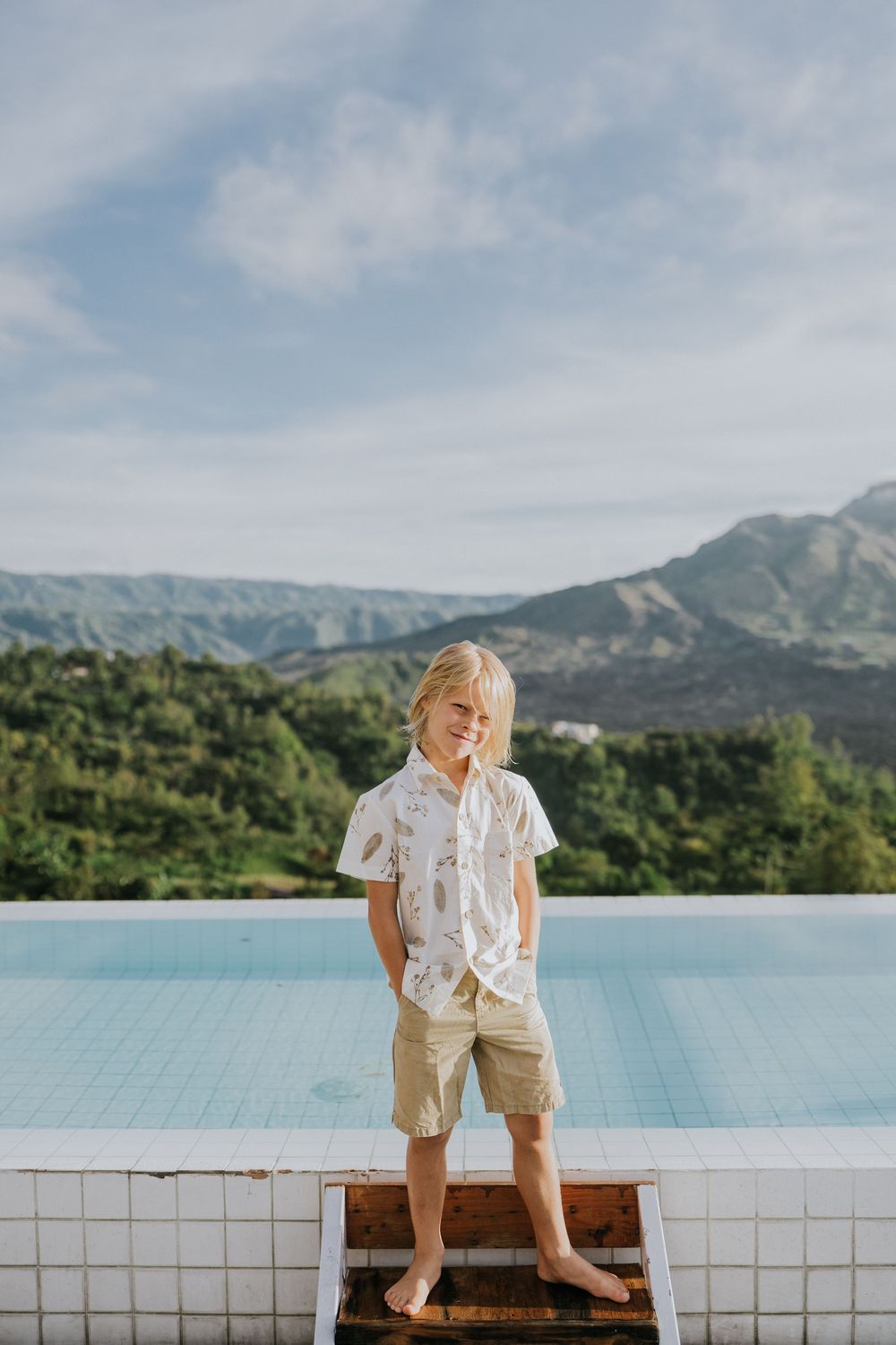 Family photography session with scenic Kintamani backdrop.