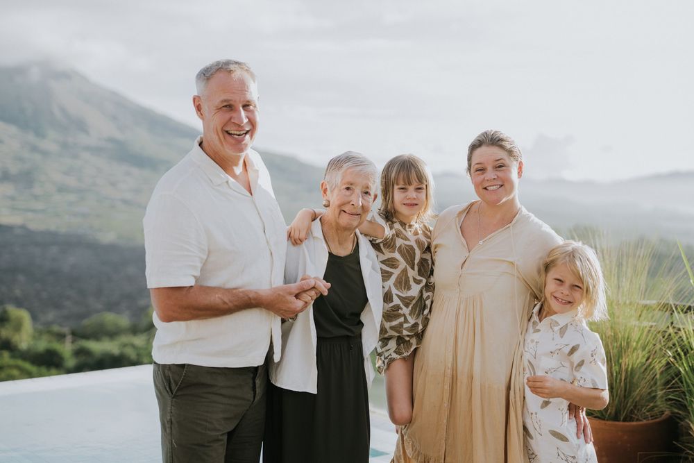 Family photography session with scenic Kintamani backdrop.