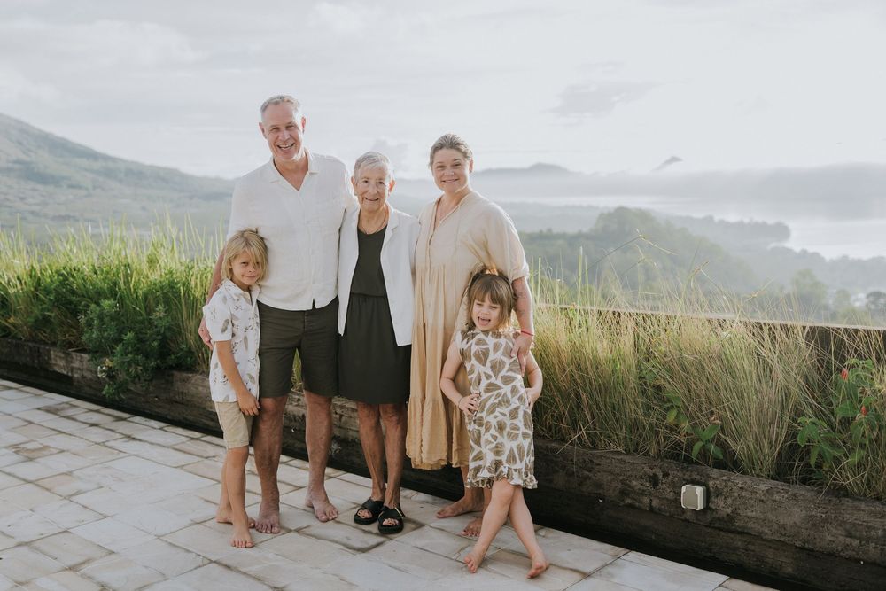 Family photography session with scenic Kintamani backdrop.