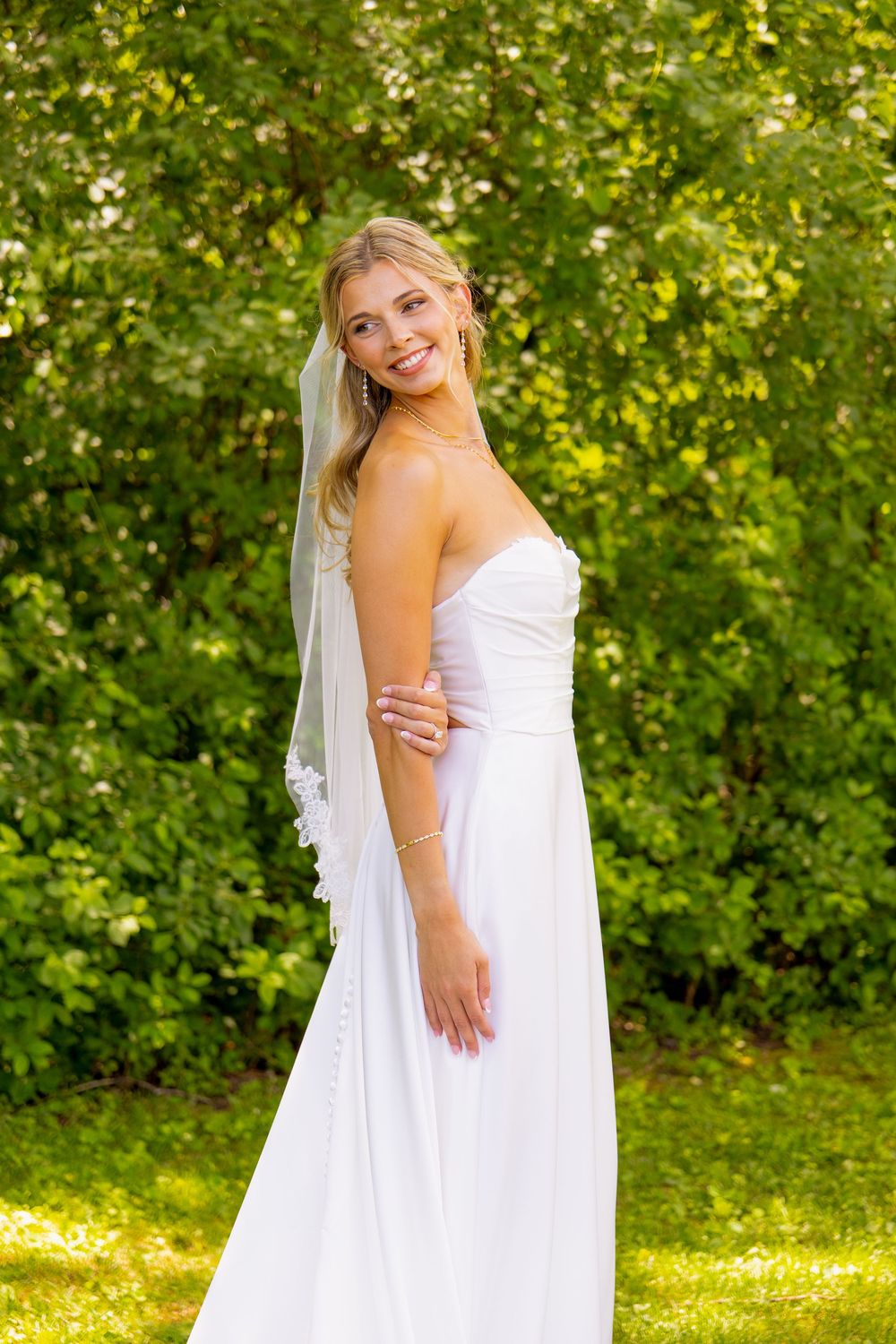 A woman in a wedding dress and veil