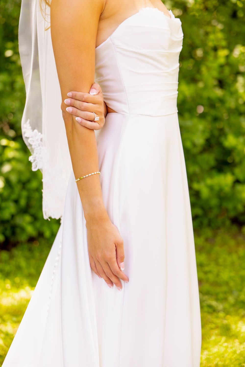 A woman in a wedding dress and veil