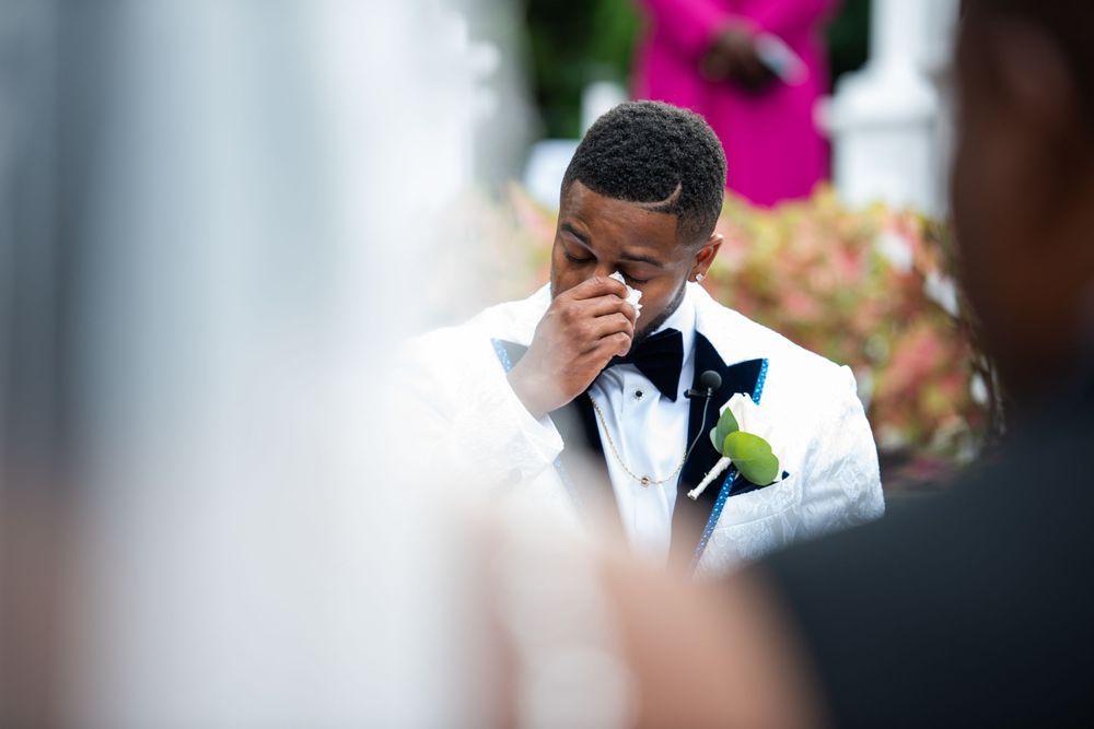 Groom emotional tears during wedding ceremony candid photography Orlando Weddings by Ray