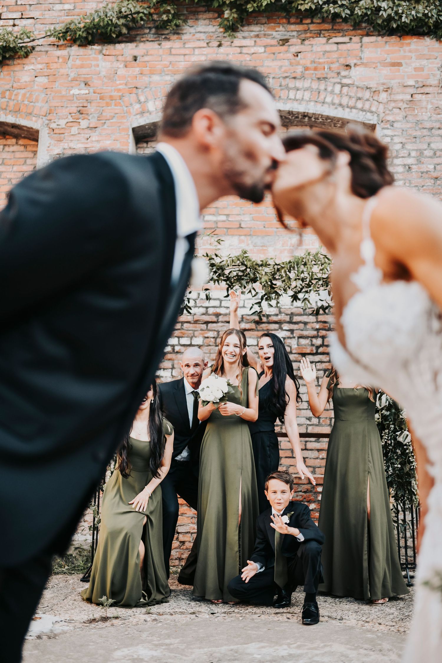Megan and Joel with their wedding party at The Cotton Mill McKinney
