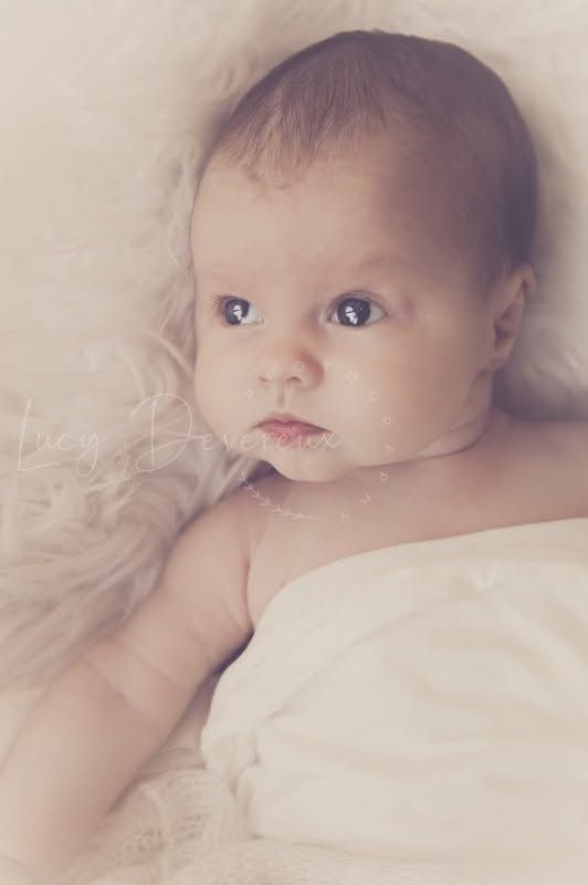 newborn baby daughter. Joyous. Family newborn photo session