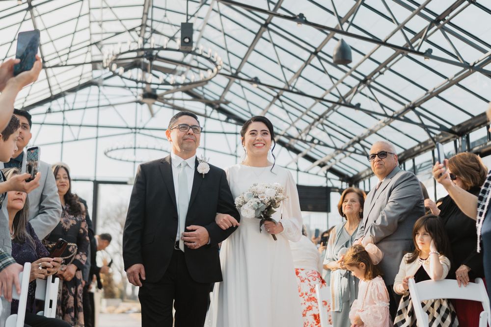 Bride and father walking hand in hand, westwynd gardens honeybrook pennsylvania