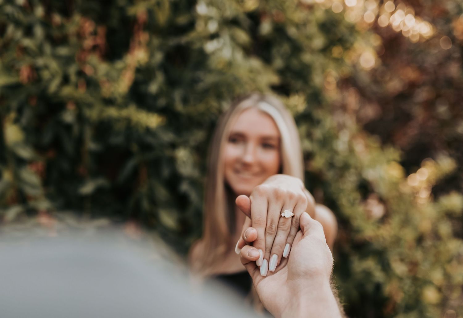 Denton Texas proposal photography capturing the moment she says yes