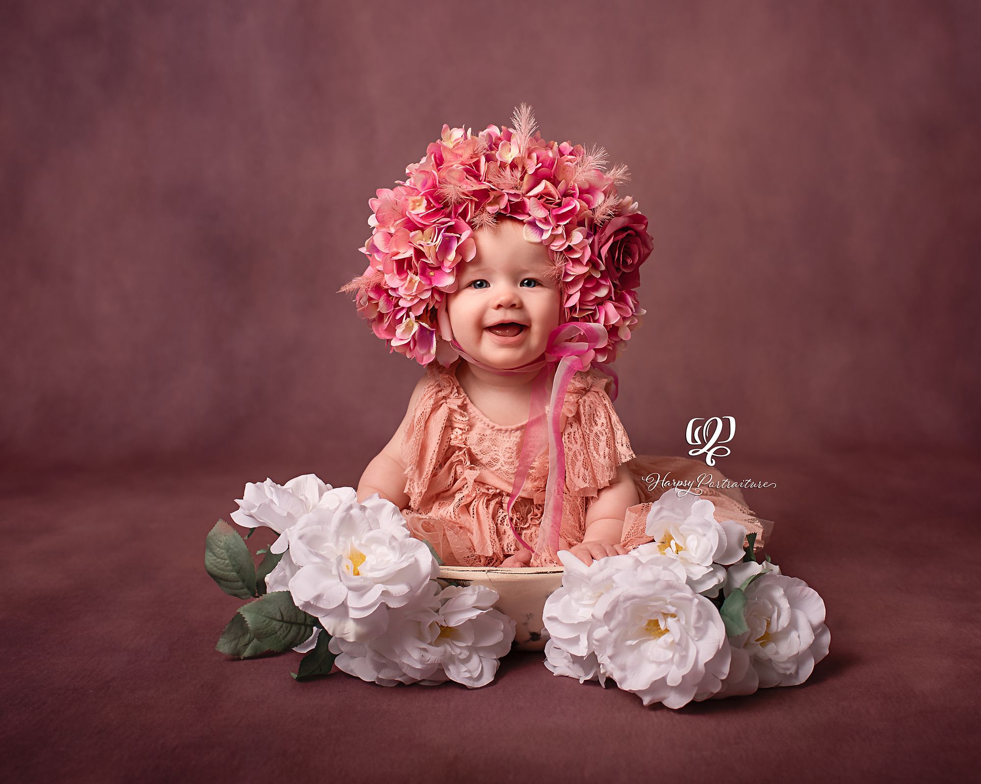 baby girl in flower bonnet professional portrait studio Lexington, SC; best photographer Lexington, SC; fine art children's photographer SC