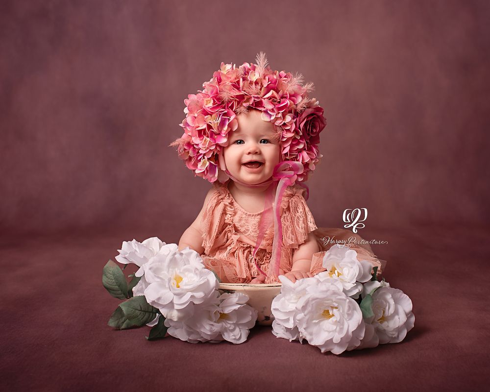 baby girl in flower bonnet professional portrait studio Lexington, SC; best photographer Lexington, SC; fine art children's photographer SC