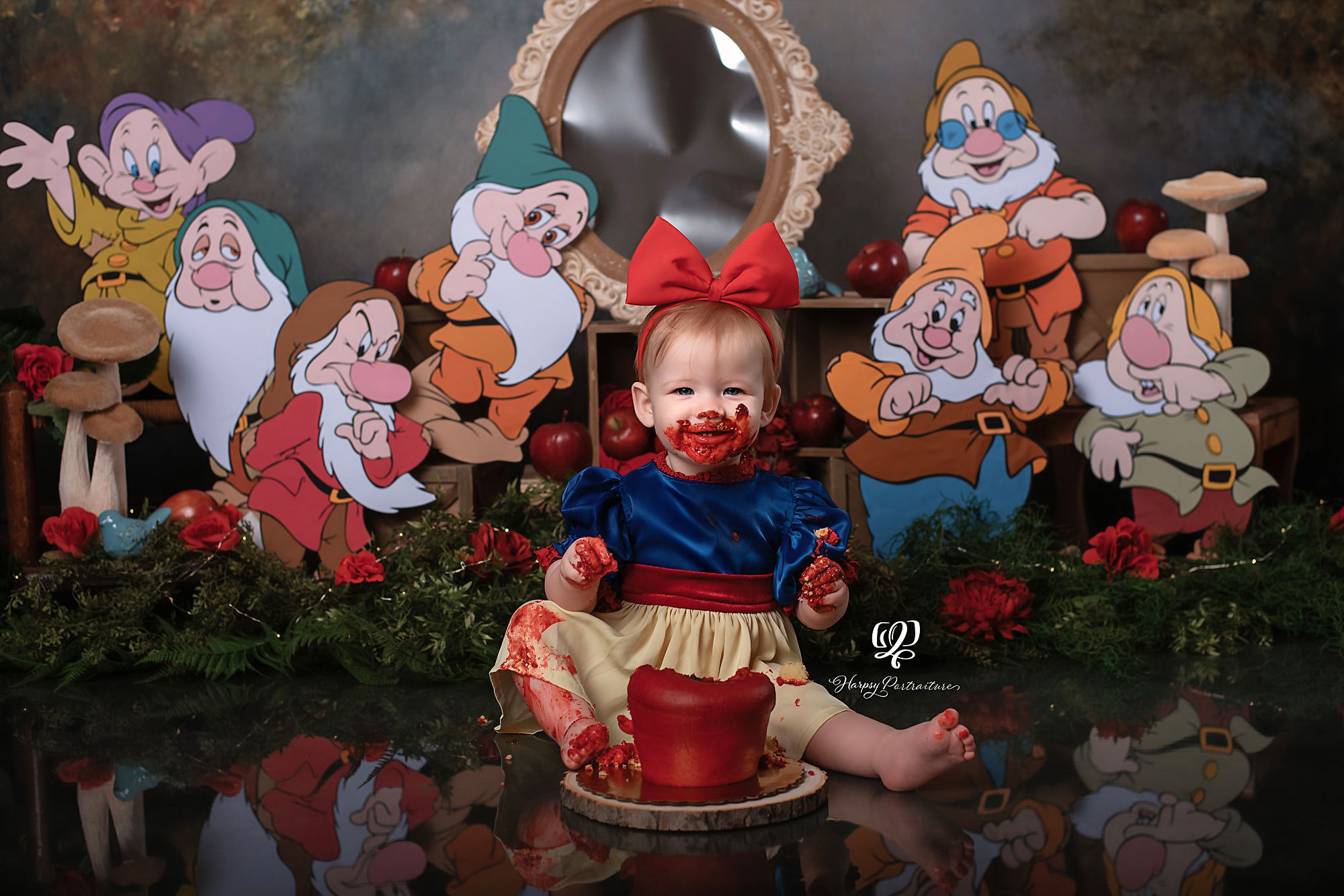 Snow White Cake Smash first birthday photoshoot with dwarves, mirror, and apple cake; best photographer, Lexington, SC; Cake Smash Session