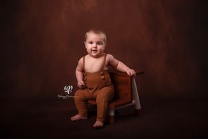 Baby boy Sitter Session photoshoot Lexington, SC best photographer; portrait studio child photographer SC; baby posed on steps in overalls