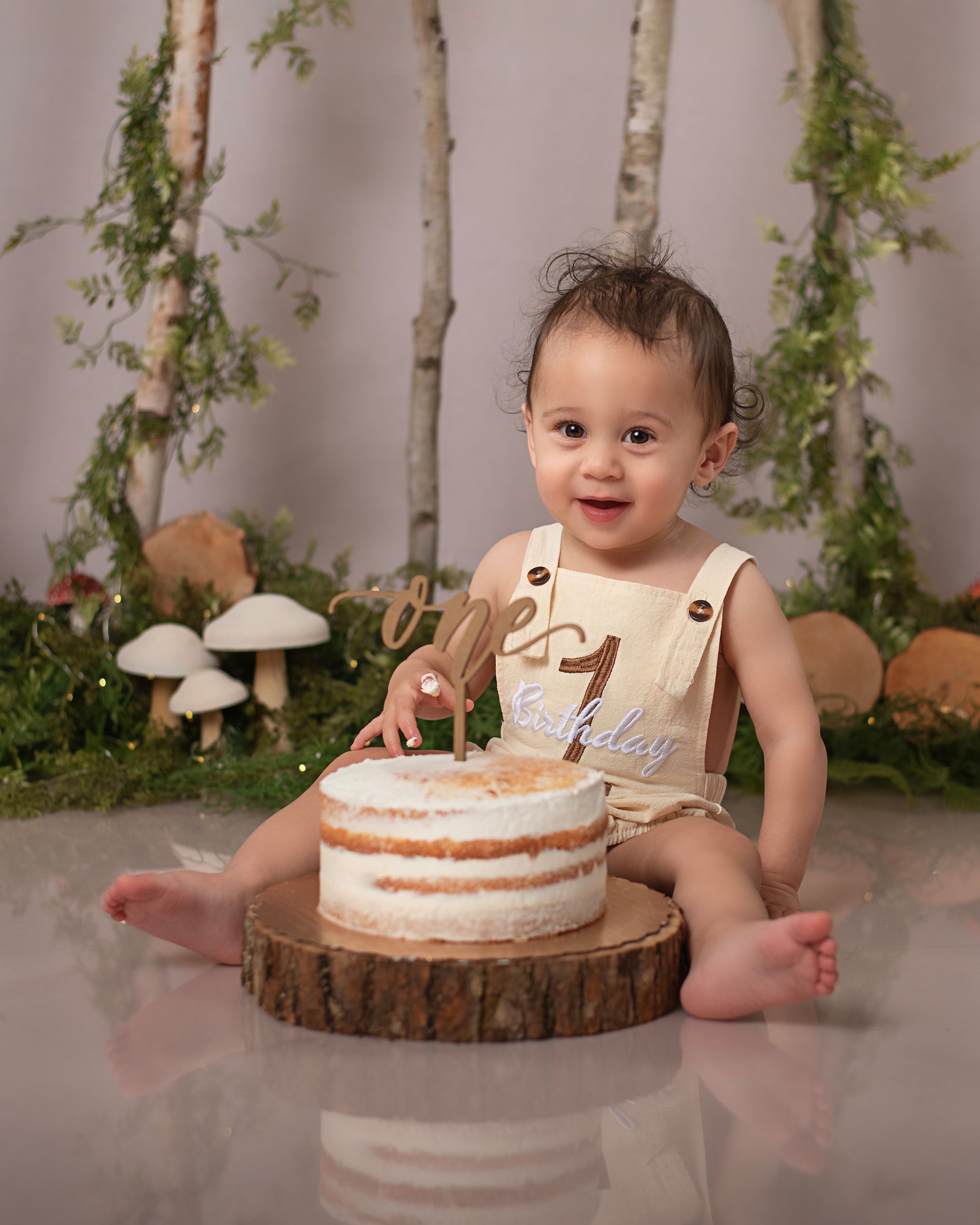 Cake Smash first birthday photoshoot nature & mushrooms; best photographer Lexington, SC; professional children's photographer SC