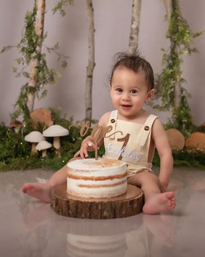 Cake Smash first birthday photoshoot nature & mushrooms; best photographer Lexington, SC; professional children's photographer SC