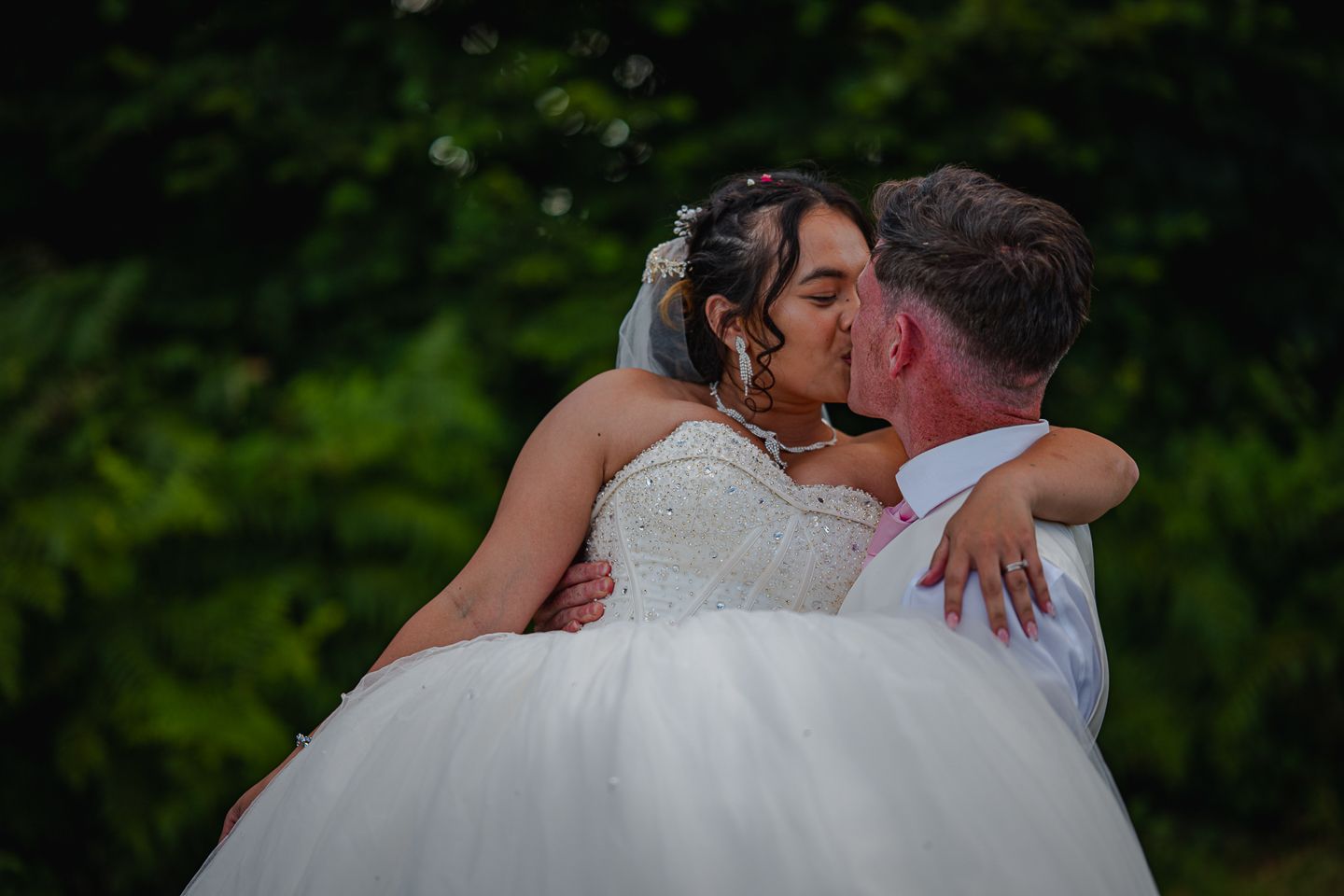 Dorset couple Embracing, by Poole, Bournemouth and Dorset wedding photographer "kris the photographer"
