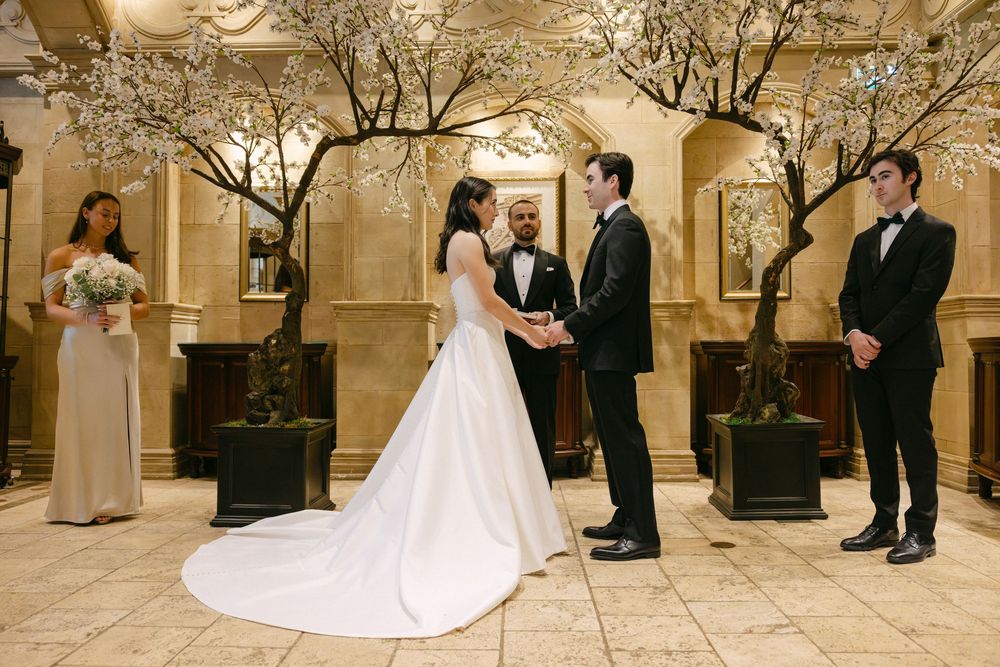 Sequence of five elegant indoor wedding ceremony photos showing couple exchanging vows in grand ballroom setting.