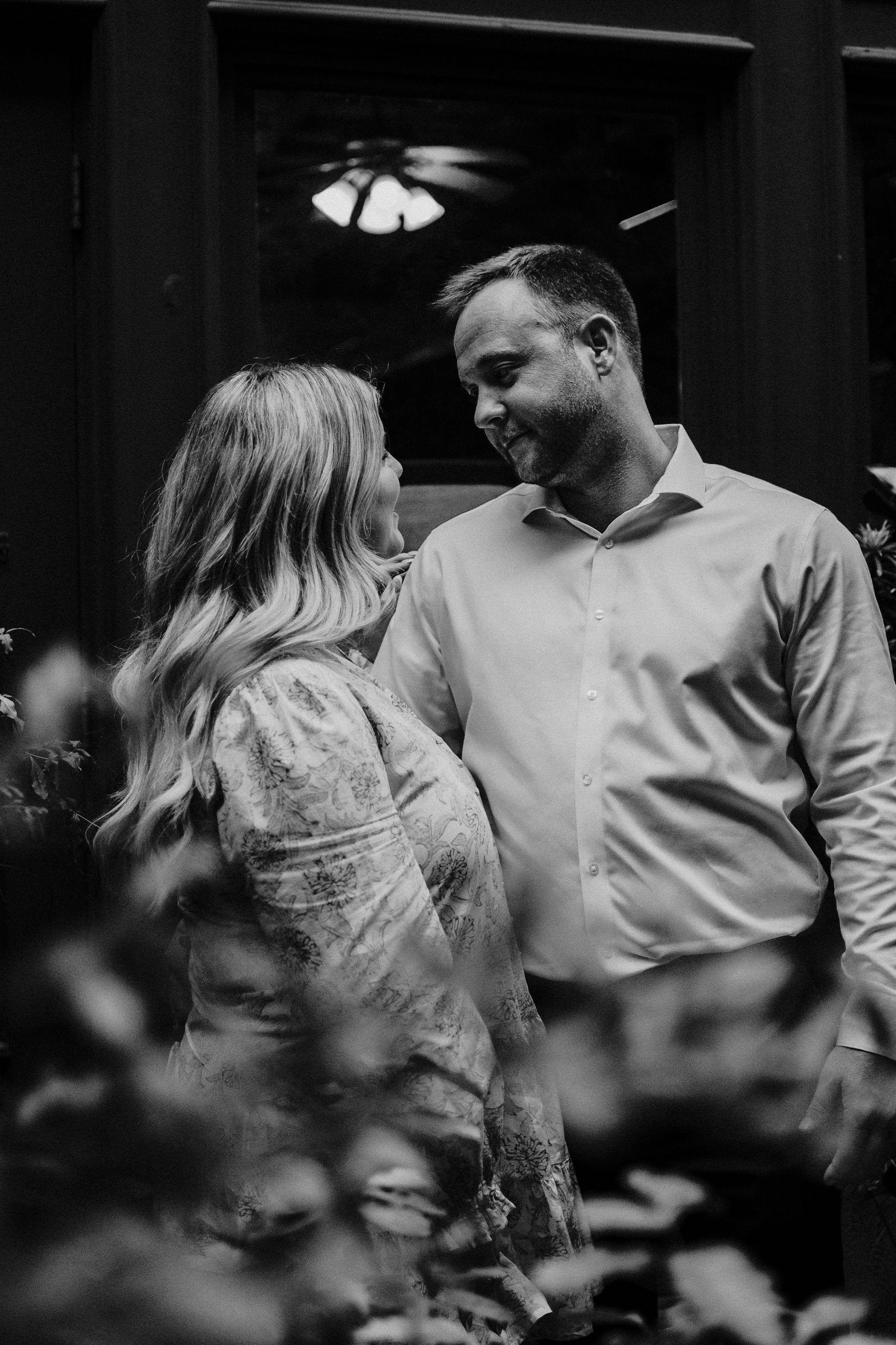A romantic black and white sequence showing a couple dancing together in an intimate moment.