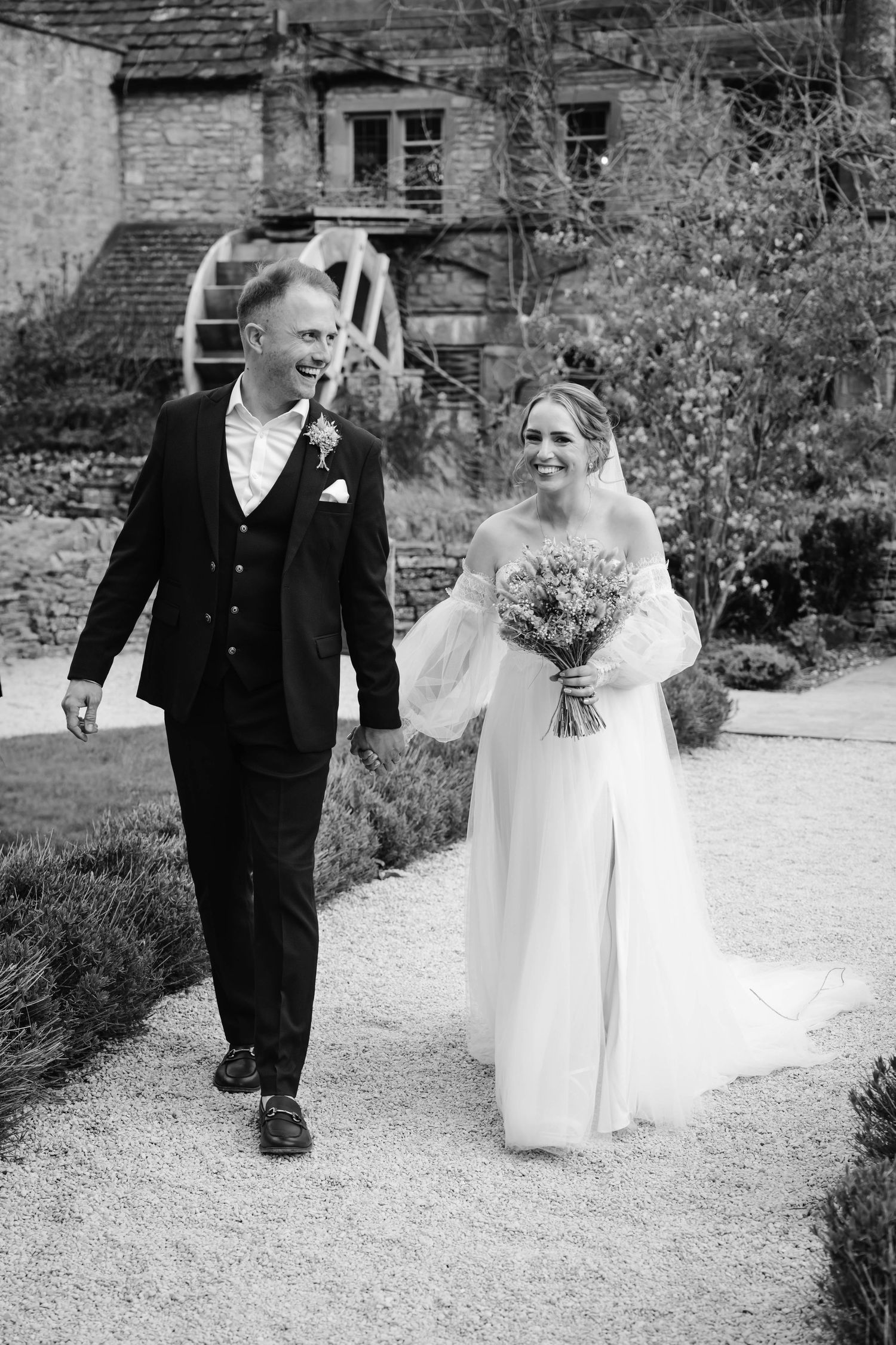 Bride and groom portraits at The Frogmill Gloucestershire in black and white editorial