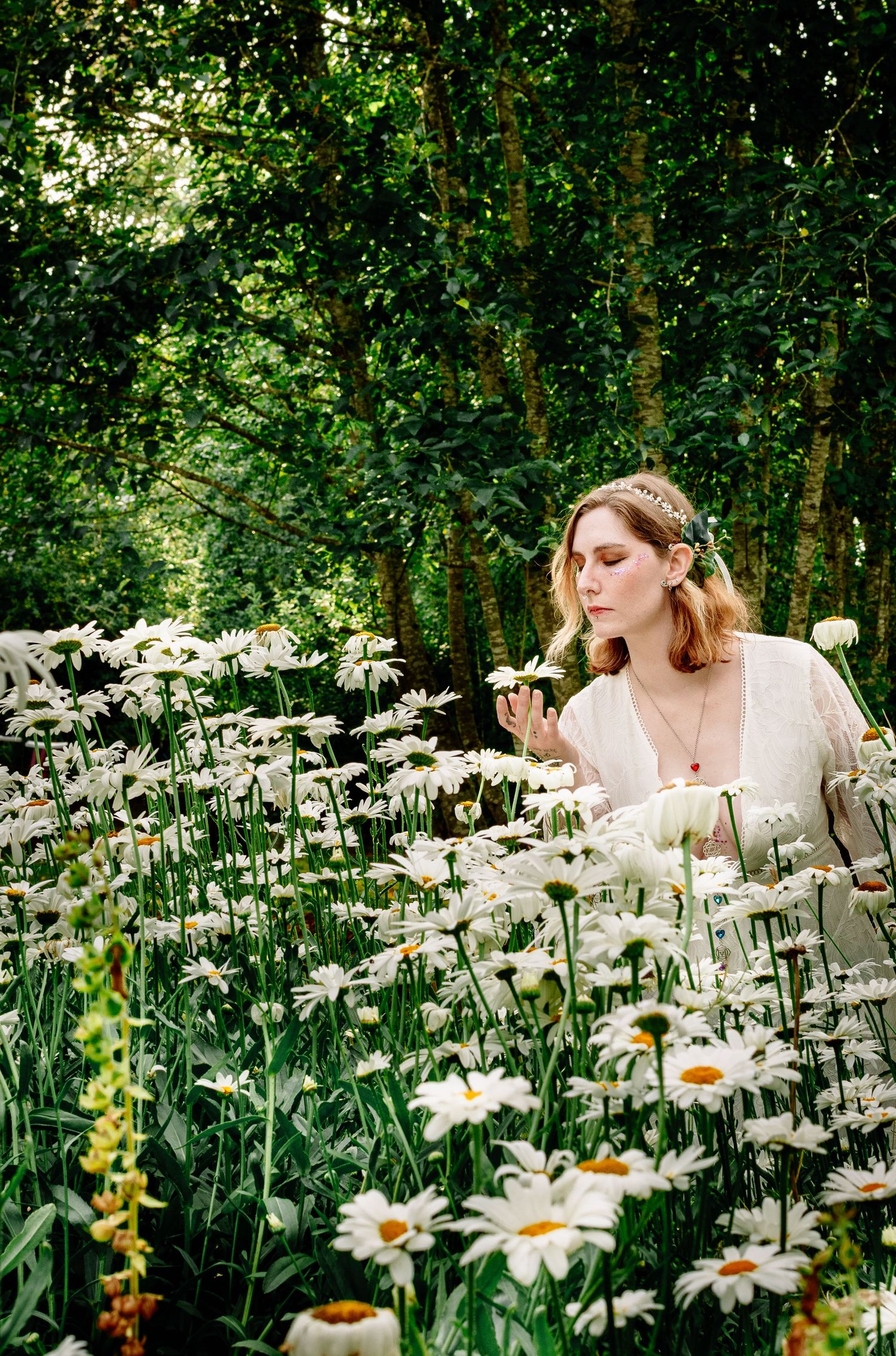 Dreamy styled collaboration portrait at The Pole Garden Monroe WA with daisies.