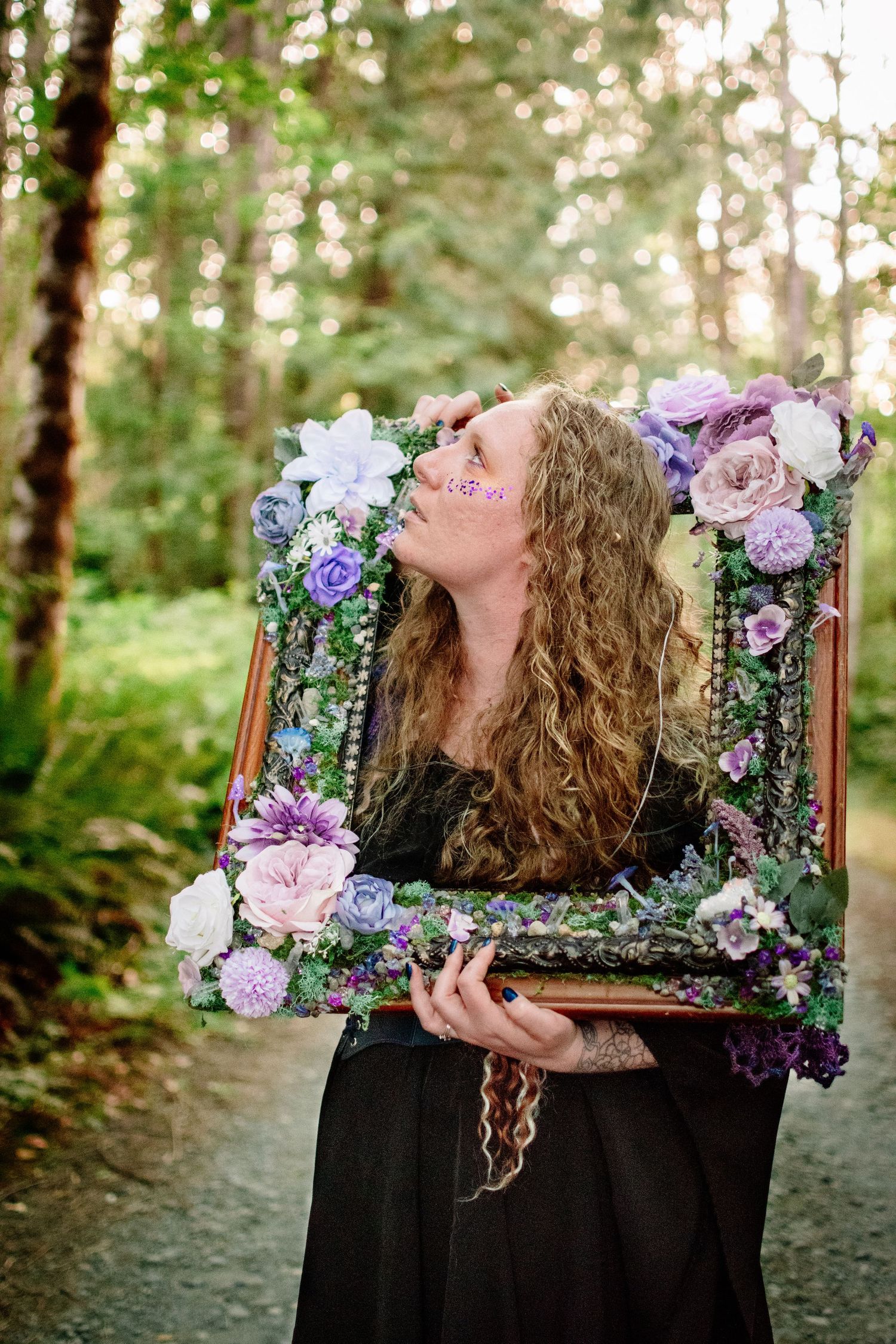 Whimsical portrait with decorated floral frame at The Pole Garden.