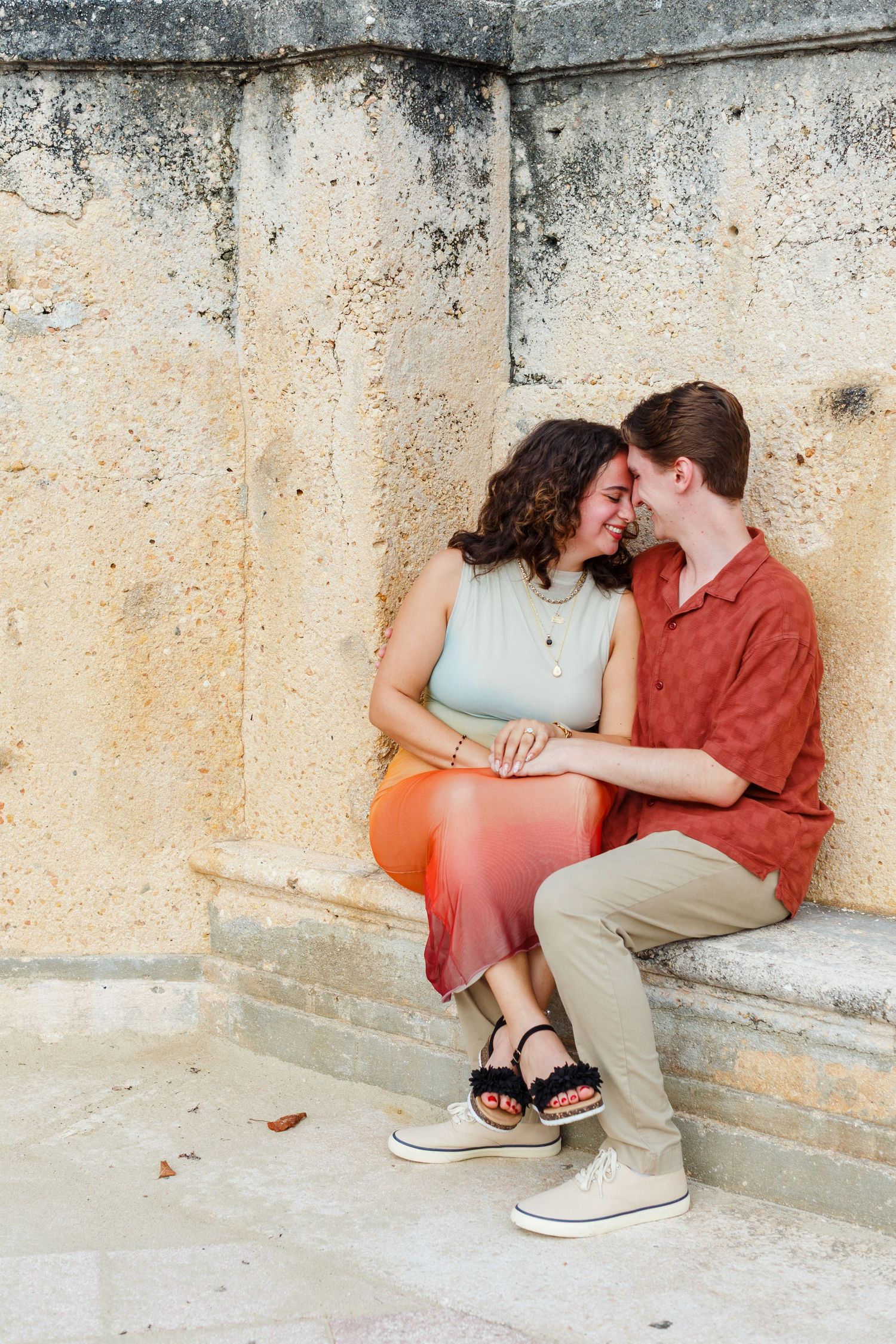 Surprise marriage proposal in Old San Juan, Puerto Rico. Paseo de la Princesa. Man and woman.