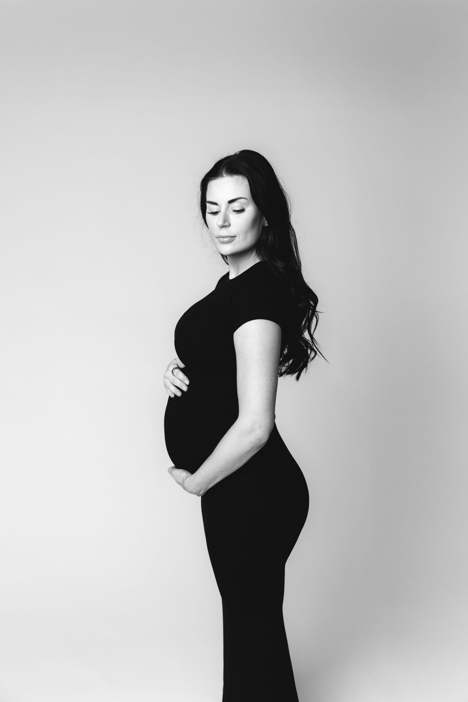 Luxury maternity photo session with soft lighting in Nashville