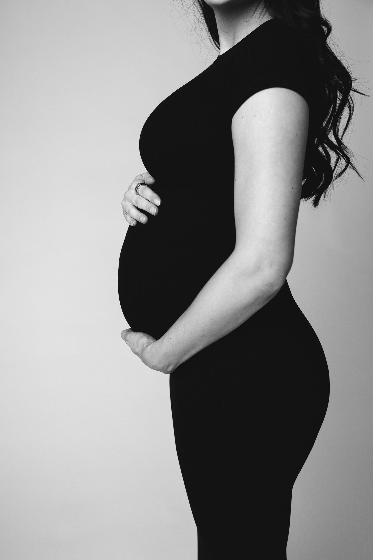 Luxury maternity photo session with soft lighting in Nashville