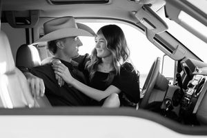 Multiple black and white photographs showing intimate moments between two people in cars.