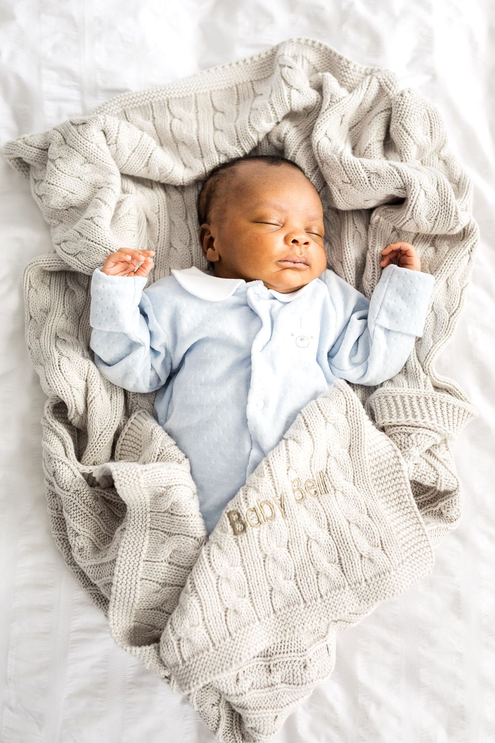 Lifestyle baby photography capturing real everyday moments at home in Islington