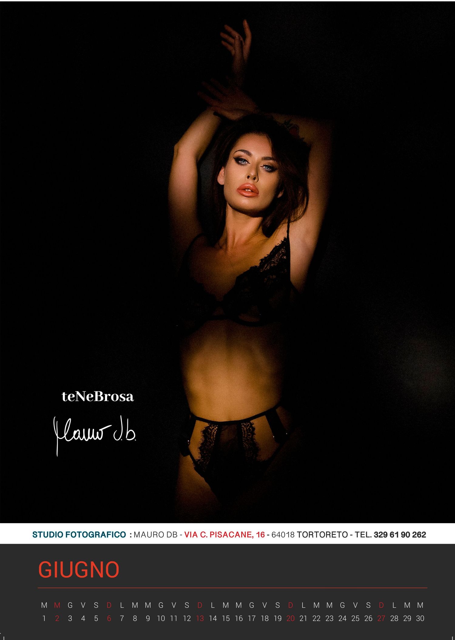 Artistic boudoir photography calendar image showing silhouette against dark background for June.