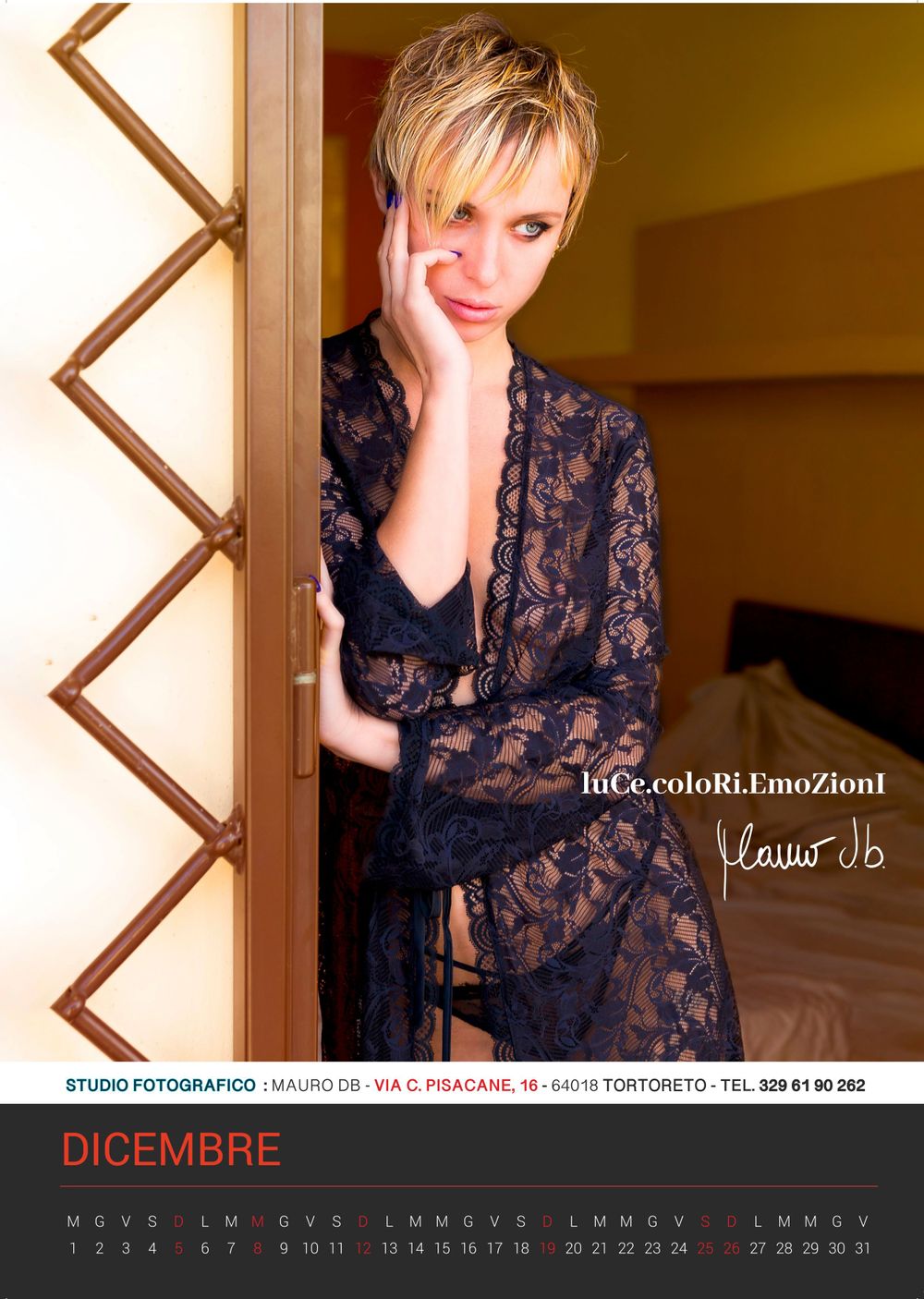 Fashion calendar photo showcasing black lace outfit in interior setting for December.